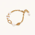 14K gold plated bracelet with freshwater pearls, filigree details, and mixed geometric elements on white background.