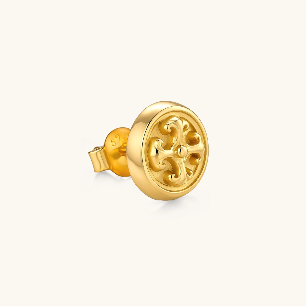 Gold circular stud earring with raised baroque scroll motif, polished bezel edge, and butterfly push-back closure. S925 stamped.