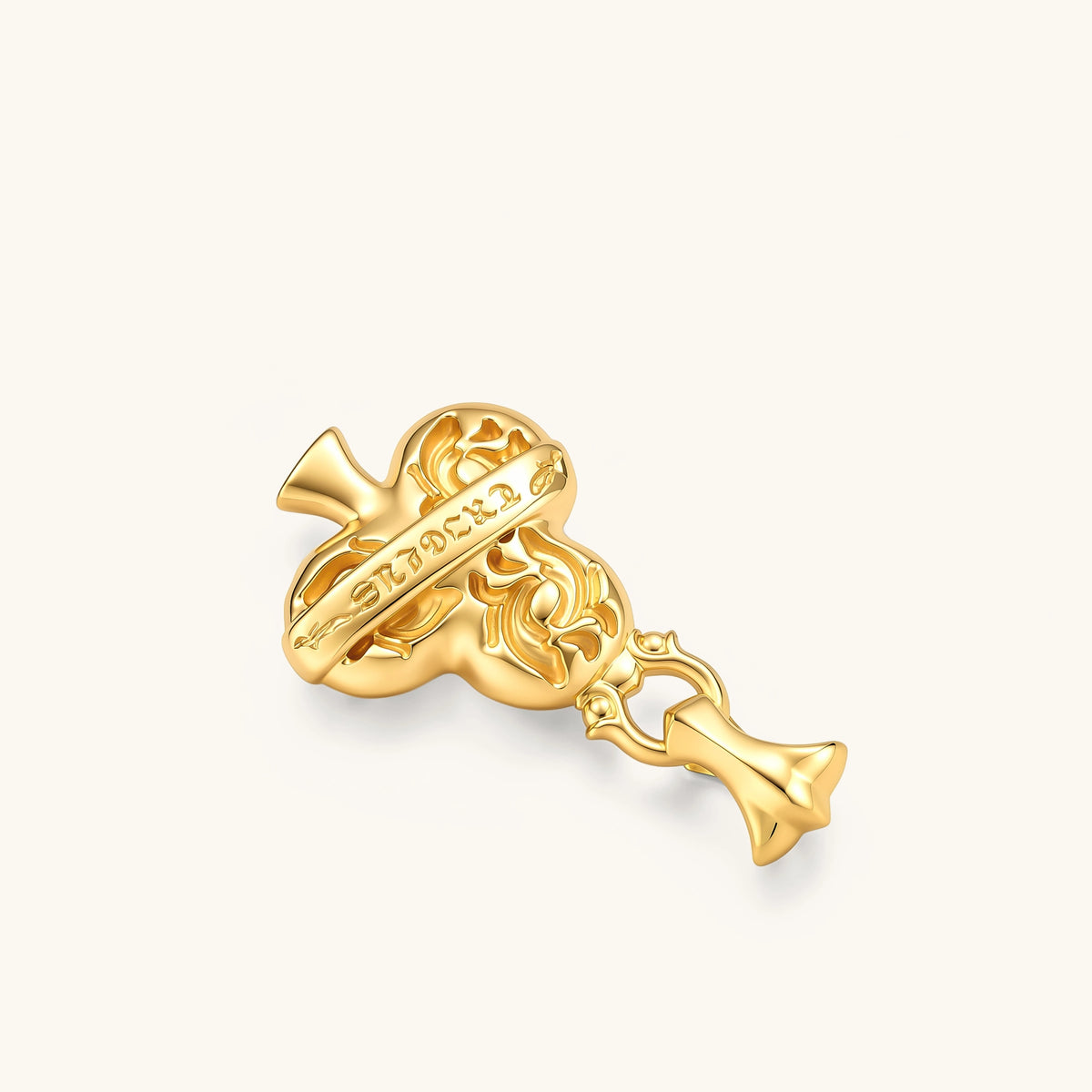 24K gold-plated clubs pendant with baroque floral engravings, scroll banner, ornate bail, and box chain. 40mm.